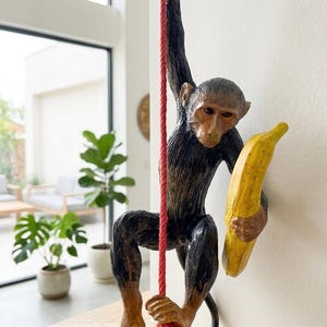 Handmade Monkey Sculpture with Banana and Red Rope Detail – Boho Home Decor