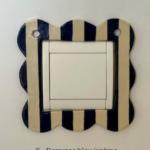 手作りのセラミック製ライトスイッチカバー - 手描きのデザイナーズライトスイッチカバー - Instagramで紹介されている商品