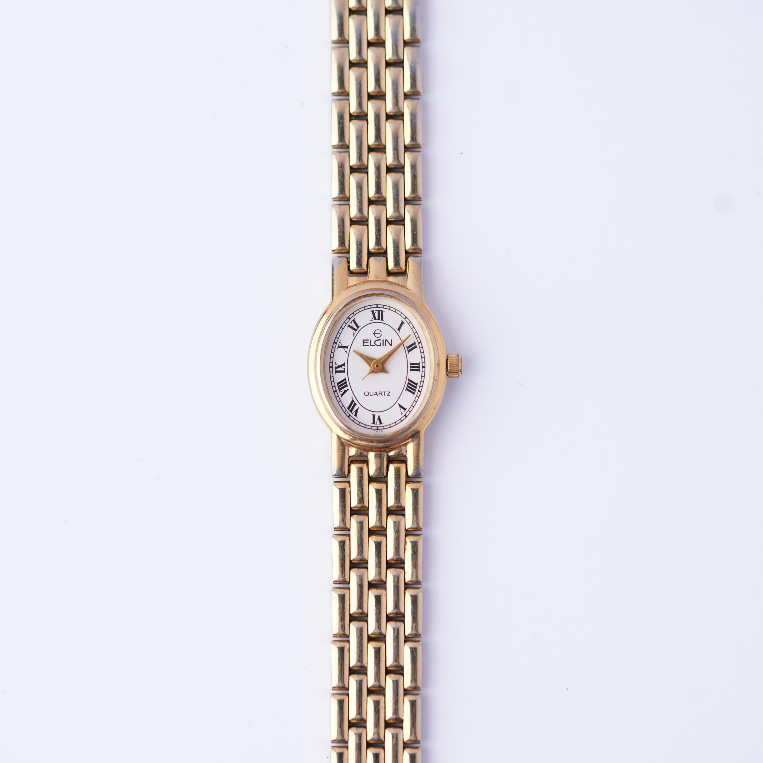 Slender Gold Vintage Wind-Up Elgin Watch with Roman Numeral Markers eBay Finds: An Incredibly Cool JLC Memovox, a Vintage Elgin  main image 3