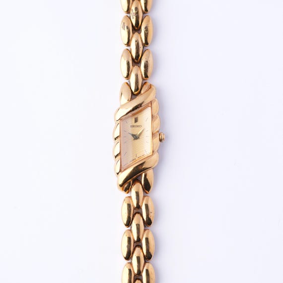 Seiko Asymmetrical Rivoli Gold Dial Half Moon Watch - Etsy display picture 1