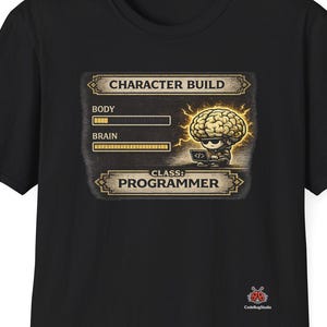 May include: Black t-shirt featuring a graphic with the text "CHARACTER BUILD" and "CLASS: PROGRAMMER". The graphic includes a brain illustration with the words "BODY" and "BRAIN" with progress bars. The shirt is a short-sleeved crew neck.