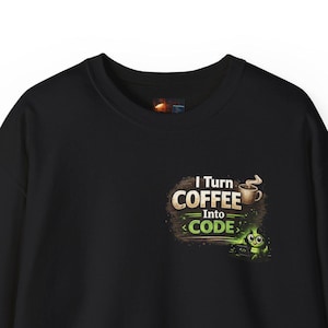 May include: Black crew neck sweatshirt with the text "I Turn Coffee Into Code" in a green and brown design. The design includes a coffee cup and a green graphic. The sweatshirt is a casual style.