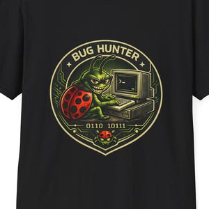 May include: Black t-shirt with a circular graphic. The graphic shows a green bug-like creature at a computer, a red ladybug, and the words "BUG HUNTER". Binary code and a skull are also included.
