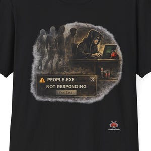 May include: Black t-shirt with a graphic depicting a hooded figure at a laptop, and the text "PEOPLE.EXE NOT RESPONDING." The design includes silhouettes and a small logo. A casual, comfortable tee.