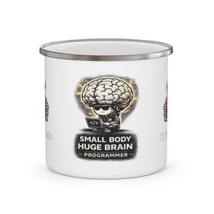 May include: White enamel mug with a silver rim. The mug features a cartoon graphic of a programmer with a large brain, sunglasses, and a laptop. The text on the mug reads "SMALL BODY HUGE BRAIN - PROGRAMMER".