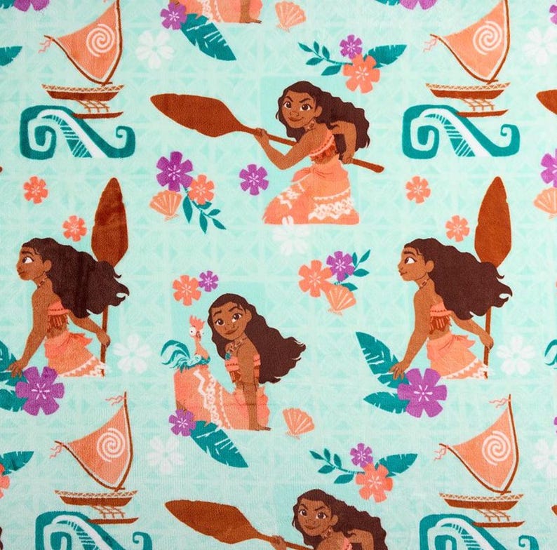 May include: A light blue fabric featuring a repeating pattern of a Polynesian woman, boats, flowers, and other tropical elements. The woman is depicted in a traditional outfit, holding a paddle. The design includes coral, orange, and purple accents.