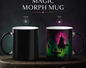 May include: A Magic Morph Mug with text at the top. The left mug is solid black when cold. The right mug shows a colourful scene when hot, featuring a witch on a broomstick, a scarecrow, and a cat against a vibrant green and pink background.