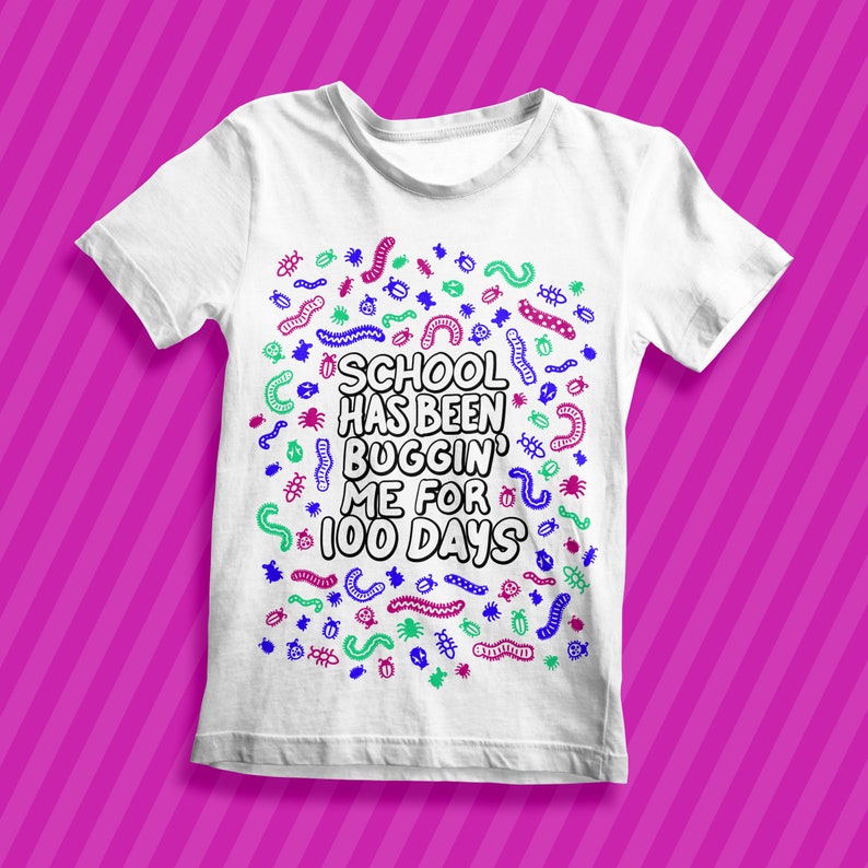 Pu&ograve; includere: Maglietta bianca con un design di insetti colorati e il testo "School has been buggin' me for 100 days."