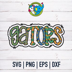 May include: Colorful, patterned word art that says "gators" in a whimsical font. The word art is outlined in black and has a dotted line around the outside. The background is a white woodgrain.