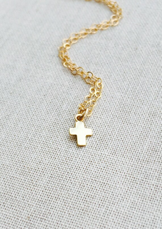mini gold cross pendant