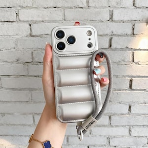 Luxury Puffer Down Jacket iPhone Case Soft Cushion Bumper Cover with Strap for iPhone 17 Air 17 Pro Max 16 15 14 13
