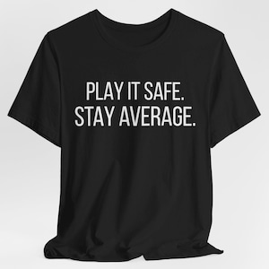 Play It Safe Stay Average T-Shirt, Motivational Quote Tee, Minimalist Black Shirt, Bold Typography Tee, Streetwear Graphic Shirt