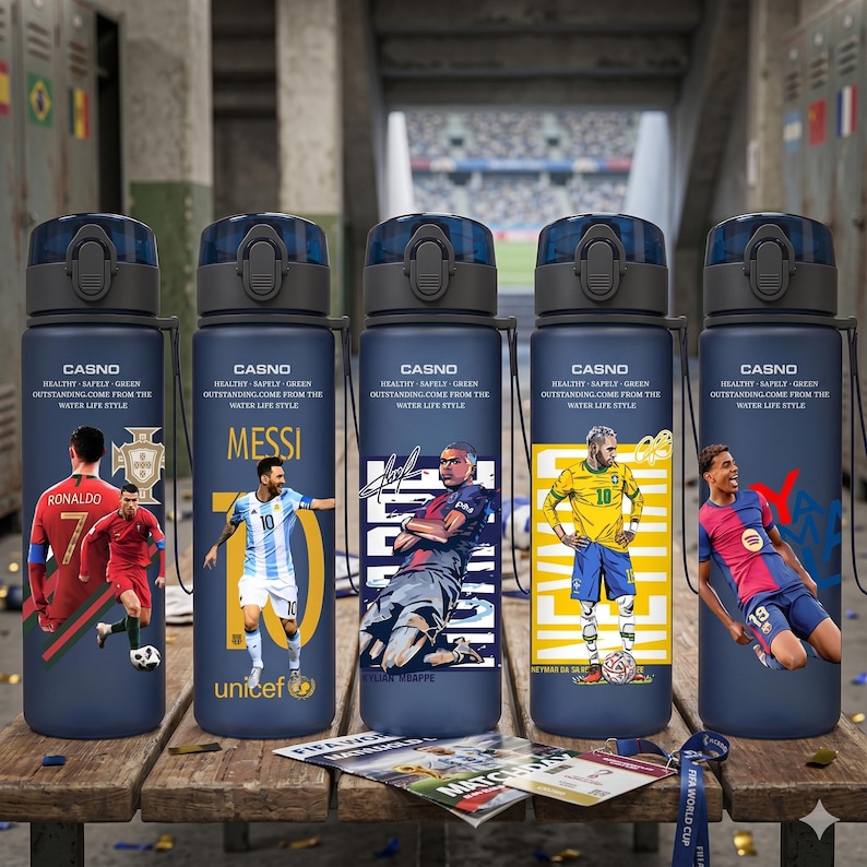 May include: Five navy blue water bottles with black lids, each featuring a different soccer player graphic. The bottles have the word "CASNO" and the text "HEALTHY-SAFELY-GREEN OUTSTANDING.COME FROM THE WATER LIFE STYLE". The players include Ronaldo, Messi, Kylian Mbappe, Neymar, and another player.