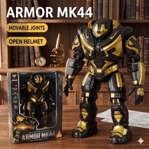 K&ouml;nnte beinhalten: Eine schwarze und goldene Armor MK44 Actionfigur mit beweglichen Gelenken und offenem Helm. Das Spielzeug wird neben seiner Box gezeigt, die ebenfalls das Armor MK44-Design aufweist. Die Box gibt an, dass das Spielzeug f&uuml;r Kinder ab 3 Jahren geeignet ist.