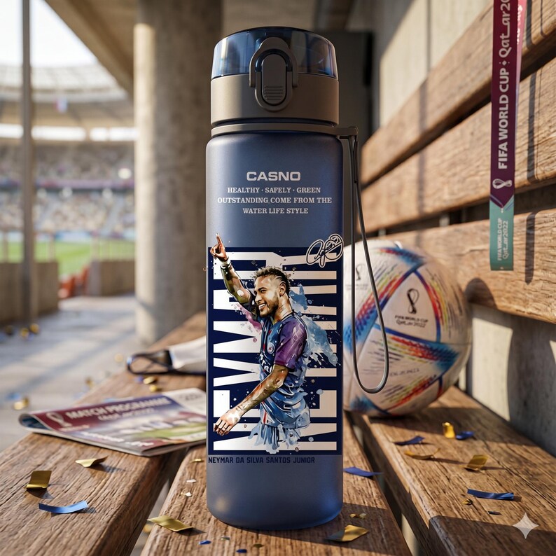 May include: A navy blue water bottle featuring a graphic of Neymar da Silva Santos Junior. The bottle has a black cap and a white and blue design. Text on the bottle reads "CASNO" and "HEALTHY SAFELY GREEN OUTSTANDING COME FROM THE WATER LIFE STYLE."