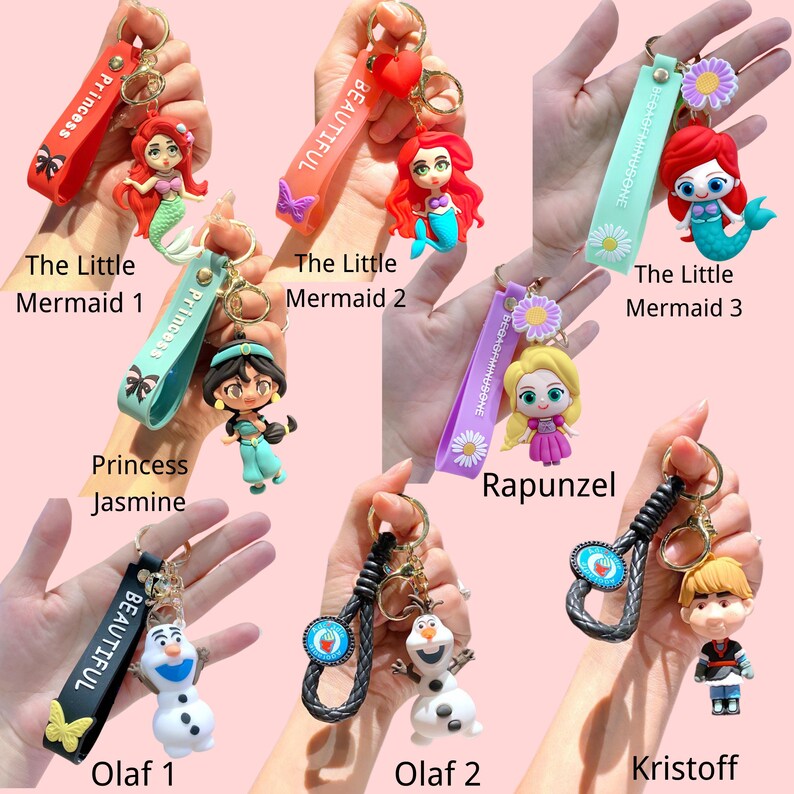 Puede incluir: Colecci&oacute;n de llaveros de personajes con princesas y personajes de Disney. Los llaveros incluyen a Ariel, Jasmine, Rapunzel, Olaf y Kristoff. Cada llavero tiene una correa con texto y un anillo de metal.
