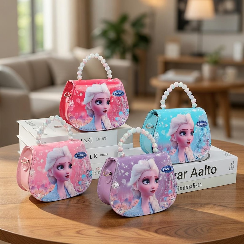 May include: Four colorful purses with pearl-like handles. Each purse features a portrait of a character from the movie "Frozen" and the word "Frozen". The purses are in shades of pink, red, blue, and purple, and are sitting on a wooden table.