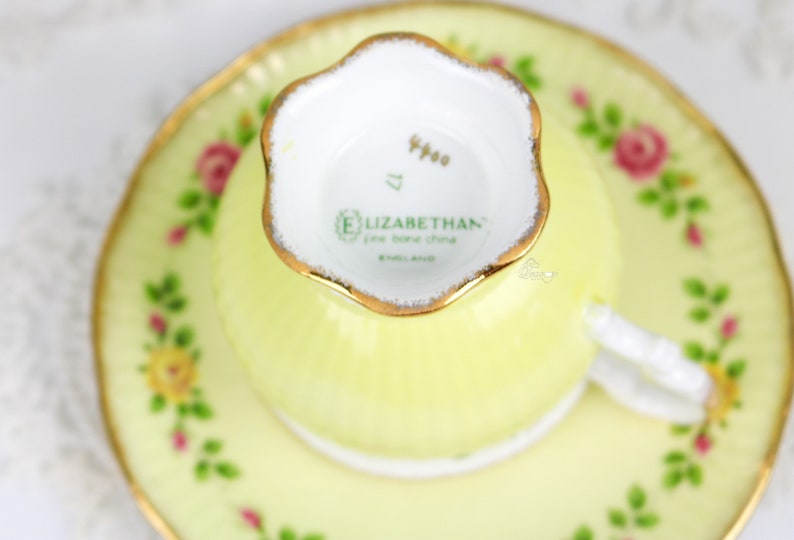 Elizabethan Pale Yellow Teacup and Saucer With Band of Roses, English