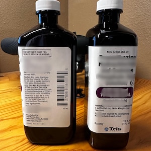 May include: A rustic wooden sign with the text "Welcome to our home" in white lettering. The sign features a distressed finish and a simple, inviting design, perfect for front door decor.