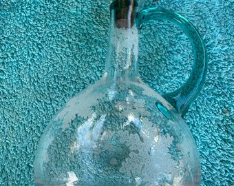 Botella de vinagre soplada a mano con diseño de copo de nieve