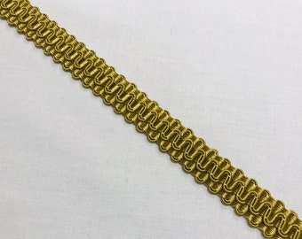 May include: Gold braided trim with a decorative pattern. This trim is perfect for adding a touch of elegance to any project.