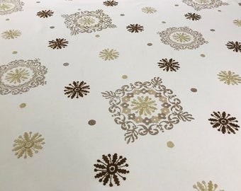 May include: White fabric with a repeating pattern of brown and beige floral designs. The fabric has a subtle texture.