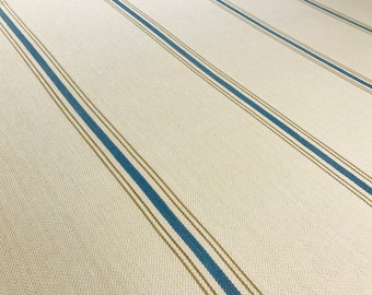 May include: White fabric with diagonal stripes in blue and brown.