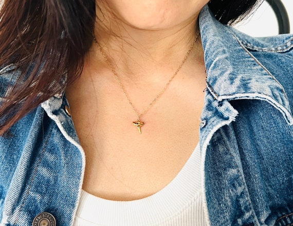 Etsy tooth shop necklace