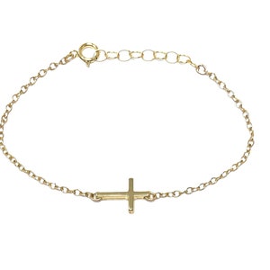 Tiny Gold Sideways Cross Bracelet Horizontal image 1