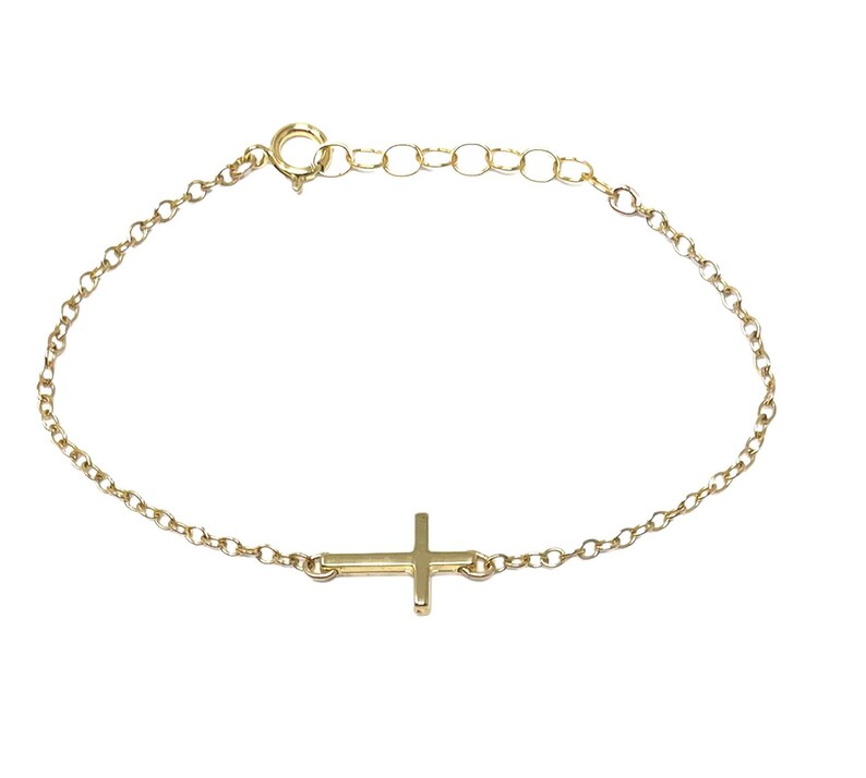 Tiny Gold Sideways Cross Bracelet Horizontal image 1