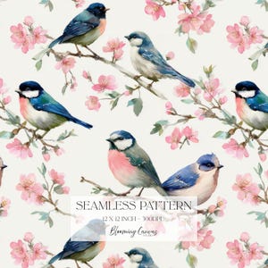 May include: Seamless pattern featuring watercolor illustrations of birds with blue, pink, and white plumage perched on branches with pink cherry blossoms. The text "SEAMLESS PATTERN" is visible.