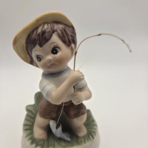 ceramics of little boy holding a fish pole for outdoors Design Toscano Frederic the Fisherman Avignon Fishing Garden Statue, 15 Inch Tall, Cast Stone Resin, Two Tone Stone Finish : Office Products ANTIQUE GERMANY PORCELAIN BOY FISHING