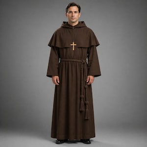 May include: A brown hooded robe with a matching rope belt and a wooden cross pendant. The robe has long sleeves and a cape-like collar. The outfit is a traditional religious garment.