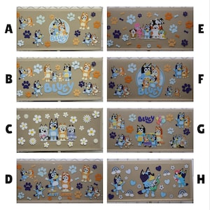 May include: A collection of rectangular decorative panels featuring the animated characters Bluey and Bingo, with paw prints and other decorative elements. Each panel has a different design, with the word "Bluey" appearing on some.