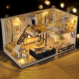 May include: A detailed miniature dollhouse with two levels, including a living area, kitchen, bedroom, and bathroom. The dollhouse is illuminated with warm lighting, highlighting furniture, decor, and a small piano. The design is intricate and inviting.