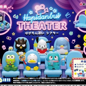 May include: A colorful display featuring miniature theater sets and character figurines. The scene includes a cinema marquee, rows of blue theater seats, and various cartoon characters. The text "Hapidanbui Theater" is prominently displayed.