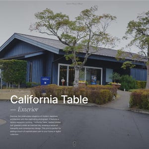 以下が含まれることがあります： モダンな日本建築のレストラン、California Tableの外観。濃い青色の外観で、緑豊かな木々が特徴です。「California Table - Exterior」のテキストが表示されています。