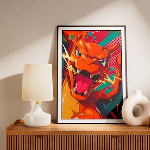 May include: A framed rectangular wall art print featuring a vibrant, stylized illustration of an orange dragon-like creature with an open mouth, sharp teeth, and yellow lightning bolts, set against a background of teal and magenta geometric patterns.