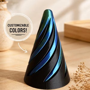 May include: A conical object with a spiralling, iridescent blue and green finish over a black base. A circular graphic overlay with a white border contains the black text CUSTOMIZABLE COLORS! with an arrow pointing towards the object.