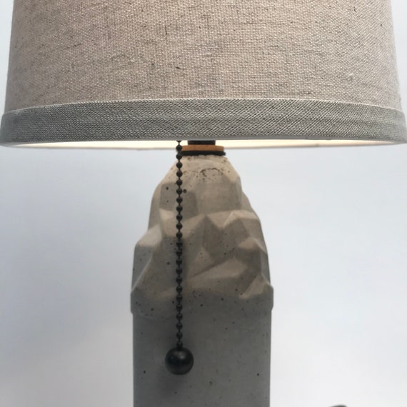 Little Iceland Concrete Lamp with oiled bronze pull chain socket bronze rubber washers listed with Oat color shade narrow lamp accent lamp