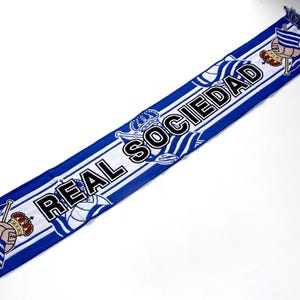 May include: A set of three ceramic mugs with a speckled, matte finish. The mugs are in shades of cream, light gray, and dark gray. Each mug has a simple, minimalist design, perfect for coffee or tea.