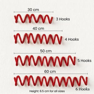 May include: Red metal wall hooks in a wavy design. The image shows four different sizes: 30 cm with 3 hooks, 40 cm with 4 hooks, 50 cm with 5 hooks, and 60 cm with 6 hooks. All sizes are 6.5 cm in height.