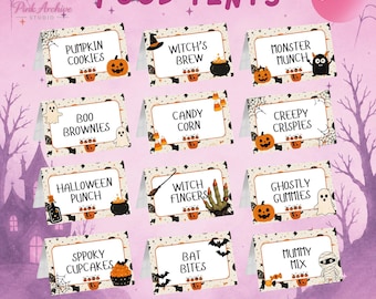 May include: A set of twelve rectangular Halloween-themed food tent cards featuring white backgrounds with orange and black illustrations of pumpkins, ghosts, bats, and cauldrons. Each card displays unique text including Pumpkin Cookies, Witch's Brew, Monster Munch, Boo Brownies, Candy Corn, Creepy Crispies, Halloween Punch, Witch Fingers, Ghostly Gummies, Spooky Cupcakes, Bat Bites, and Mummy Mix.