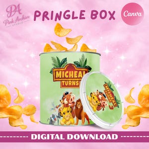May include: A cylindrical Pringle box container with a light green label featuring the text Micheal Turns 3 and illustrations of lion and warthog characters. The lid is detached and shows the same design. Golden potato chips float around the container.