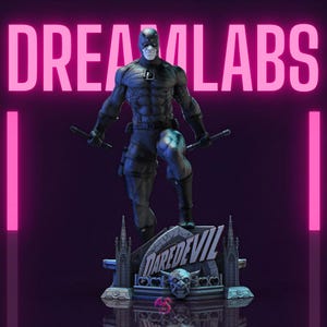 May include: A statue of the Daredevil superhero, in a dark blue suit, holding two batons. The statue is on a base with the word "DAREDEVIL" and a skull. The background has the words "DREAM LABS" in pink.