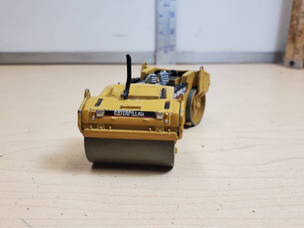 NORSCOT 1/50 CAT MILITARY CB-534D VIBRATORY ASPHALT
