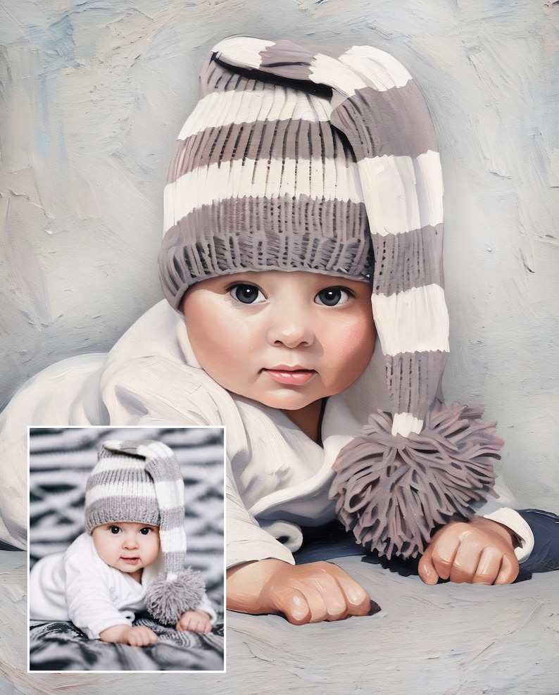 K&ouml;nnte beinhalten: Ein Baby tr&auml;gt eine lange, locker sitzende Strickm&uuml;tze mit horizontalen grauen und wei&szlig;en Streifen und einem gro&szlig;en grauen Bommel am Ende. Das Baby tr&auml;gt ein schlichtes wei&szlig;es Langarmshirt und liegt in einer ruhenden Position.