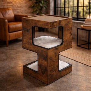 Könnte beinhalten: Ein Katzenhaus aus Holz mit dunkelbraunem Finish. Die würfelförmige Struktur hat drei offene Bereiche, die mit weißem Kunstfell ausgekleidet sind. Die obere Oberfläche ist mit einem beigen Material bedeckt. Das Katzenhaus ist modern gestaltet.