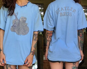 レアなヴィンテージ スタットラーブラザーズ カントリーミュージック スクリーンスター ベストフリルTシャツ ベビーブルーグリッター