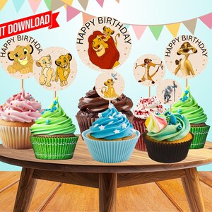 May include: A collection of cupcakes with themed toppers featuring characters from The Lion King. The cupcakes have various frosting colors, including pink, green, and blue. The toppers say "Happy Birthday" and feature Simba and other characters. The image includes a banner that says "Instant Download".